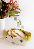 HAND OVAL WOVEN MARABA BREAD BASKET - WHITE AND BLACK SPOTTED- 11" long, 7" wide, 2.5" tall