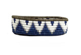 African Rwanda Woven Oval Bread Basket for Storage, Organization or Serving | Great for Remote Controller Storage or Baby Diapers and Wipes or Serving Bread on The Table Silver Blue - 11" long, 7" wide, 2.5" tall- Blue & White